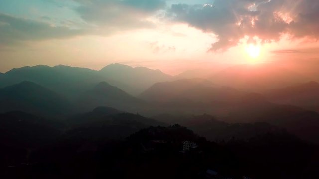 Sunset above valley in the Himalaya mountains, Nepal