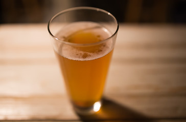 Craft beer on wood table in a pub