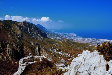 Landscape. View from the top of the mountain to the coastline of North Cyprus and the wall of the Castle of St. Hilarion. Cyprus, the castle of St. Hilarion