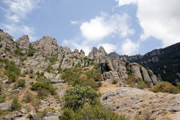 Fototapeta na wymiar Amazing rock shapes on the slope of the mountain South Demerdzhi (Ghost valley), Crimea 
