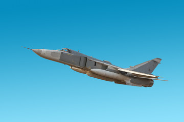 Fototapeta na wymiar Military jet bomber Su-24 Fencer flying a blue background