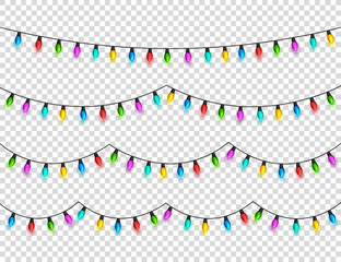 Fototapeta premium Christmas glowing lights on transparent background. Garlands with colored bulbs. Xmas holidays. Christmas greeting card design element. New year,winter.