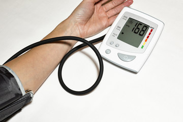 Measuring blood pressure and pulse while nervous, healthy concept