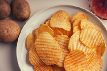 Crispy potato chips and potato 