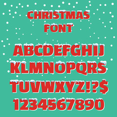 Christmas holiday vector red font. Christmas font with snow and ice, abc and digit illustration on green background. Retro 3d font with snow caps.