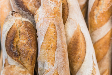Organic bread loafs at a street food market. Selective focus