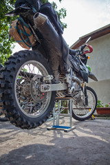 Enduro dirt bike high prepearing for the trip in the mountains