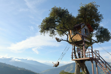 The Swing At The End Of The World Located At Casa Del Arbol, The Tree House In Banos De Aqua Santa, Ecuador, South America - obrazy, fototapety, plakaty