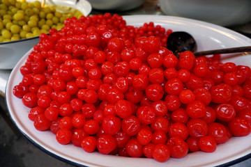 Preserved cherry sell in floating market in Thailand