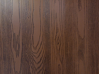 The dark brown wood background and texture