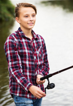 Teenage boy fishing