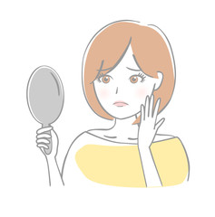 鏡を見る女性　悲しい
