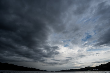 dark storm clouds with background,Dark clouds before a thunder-storm.