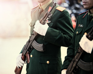 vietnam solder in long rifle weapon marching outdoor