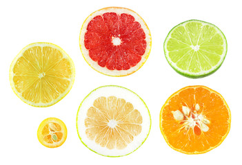 Fototapeta na wymiar Set of slices of different citrus fruits isolated on white background