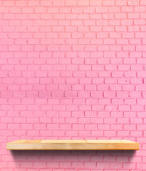 Empty wood bookshelf on pink brick wall background,Backdrop interior mock up for display or montage of product for advertising online