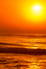 Beatiful red sunset over sea surface