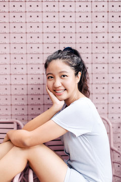 Happy Asian young woman smiling