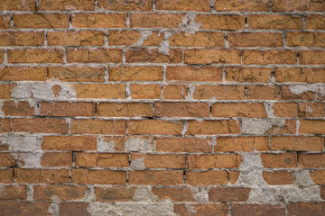 Old ruined brick wall texture. Grunge background