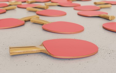 red ping pong paddles scattered on a white surface with shallow depth of field