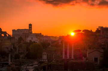 Rome and Roman Forum in Autumn (Fall) on a sunrise with beautiful stunning sky and sunrise colors