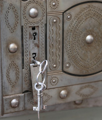 ancient safe with double lock and iron keys