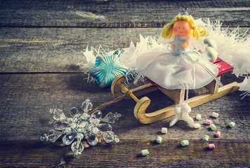 beautiful snow maiden in Santa Claus sleigh
