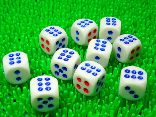 Dice on green background