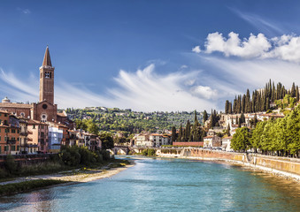 A view of the river Adige with the Church of St. Anastasia, Verona, Italy
