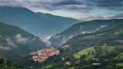 Fototapeta na wymiar Foggy valley in the village of Preci, Umbria, Italy