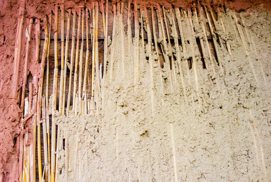 Reed mat for plastring the walls with clay and sand adobe