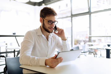 Businessman on coffee break in cafe