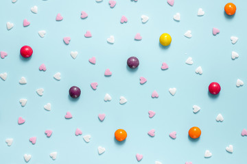 lollipop design with sugar candys on blue background top view pa