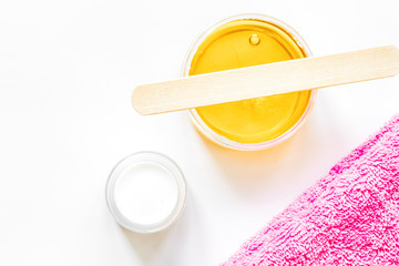 concept depilation with wax on white background top view