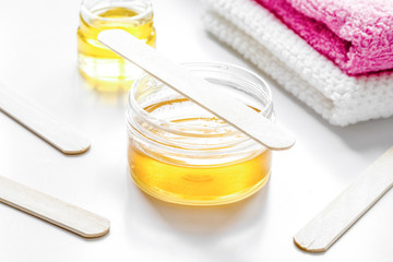 wax for depilation on white background