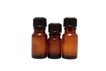 three bottles of aromatherapy oils isolated close-up