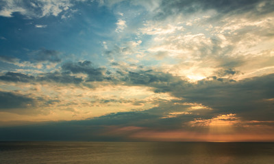 Colorful sunset over calm sea in summer