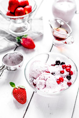 organic homemade ice cream in glass bowl on wooden background