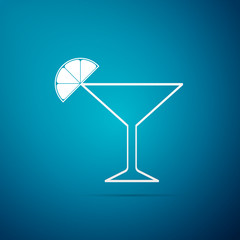Martini glass icon isolated on blue background. Cocktail with lime symbol. Flat design. Vector Illustration