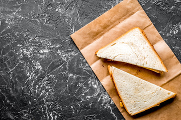 food set with sandwich and paper bag table background top view m