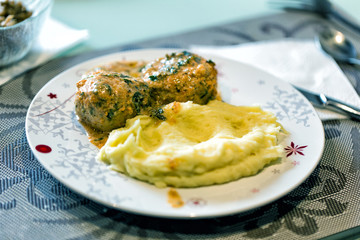 Two juicy cutlets with mashed potatoes