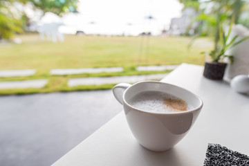 coffee with blurred nature background