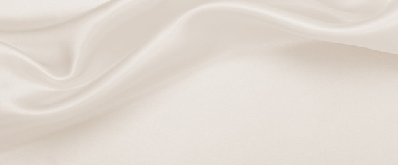 Smooth elegant golden silk or satin luxury cloth texture as wedding background. Luxurious background design. In Sepia toned. Retro style