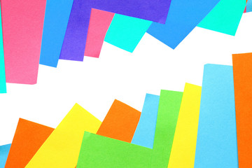 Pieces of colored torn paper as a background. copy space