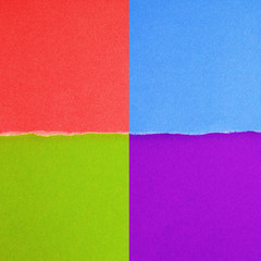Fototapeta premium Pieces of colored torn paper as a background. copy space