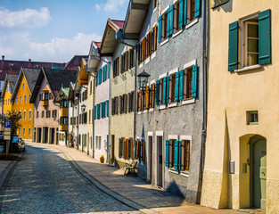 Fototapeta na wymiar Beautiful street of old buildings, Fussen city, Germany