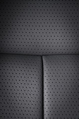Part of black  leather car seat detail