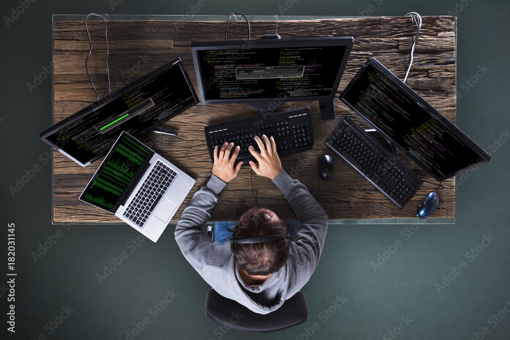 Leinwandbilder Hacker Stealing Data From Multiple Computer