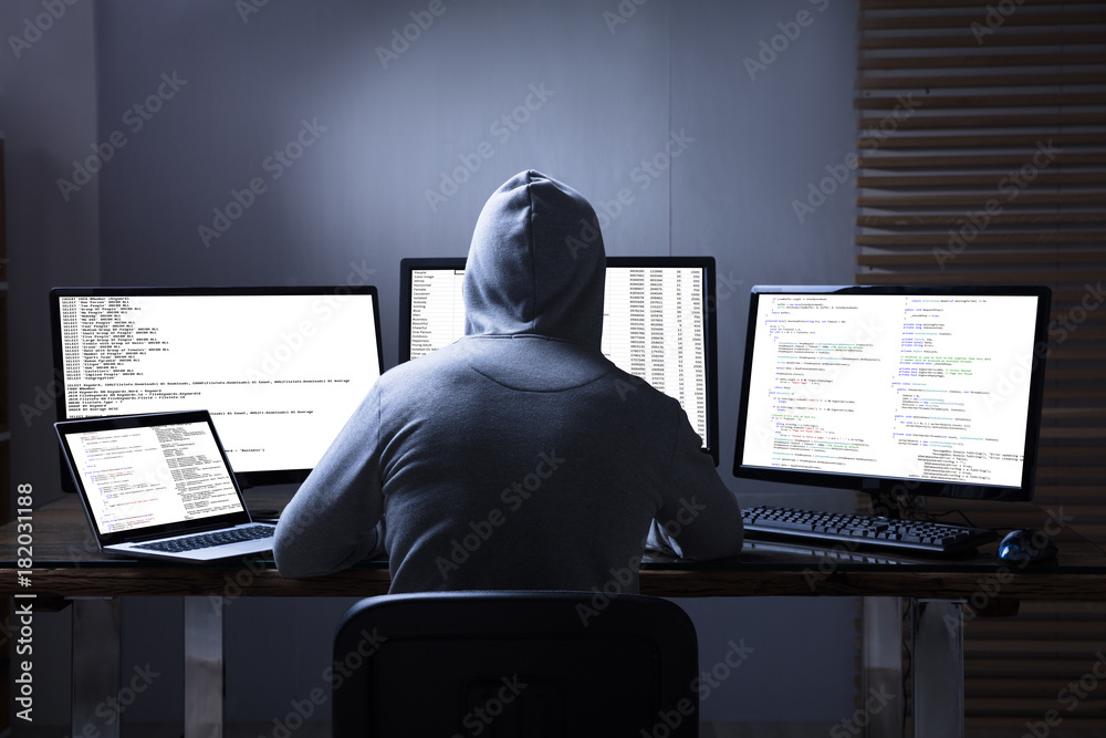 Leinwandbilder Hacker Using Multiple Computers For Stealing Data