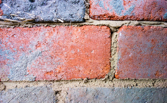 Compressed earth blocks with different clay background